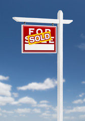 Left Facing Sold For Sale Real Estate Sign on a Blue Sky with Clouds.