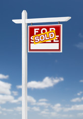 Right Facing Sold For Sale Real Estate Sign on a Blue Sky with Clouds.