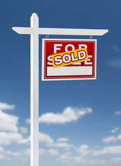 Right Facing Sold For Sale Real Estate Sign on a Blue Sky with Clouds.