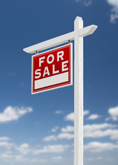 Left Facing For Sale Real Estate Sign on a Blue Sky with Clouds.