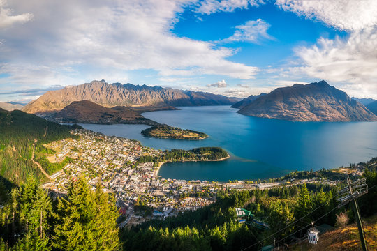 Queenstown Panorama at golden hour, New Zealand, South Island. View from Queenstown Skyline, main attraction in the alpine city.