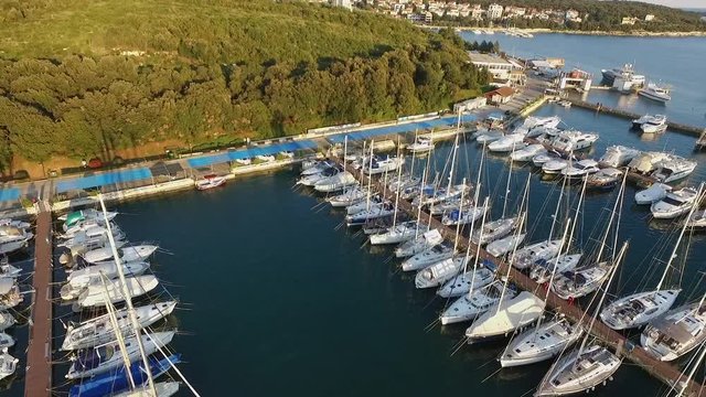 Drone Footage Of Boats Moored, Yachts and Ships in Marine. Sailboats docket in Port at Pula Croatia. 