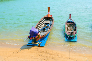 wooden longtail boats   near Chalong pier, Phuket Thailand
