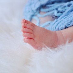 Baby feet in towel