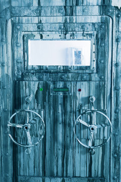 Image of locked grey door of lab