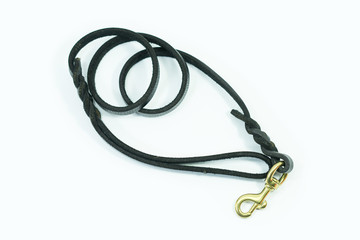 Pet leash of leather brass hook isolated on white background.