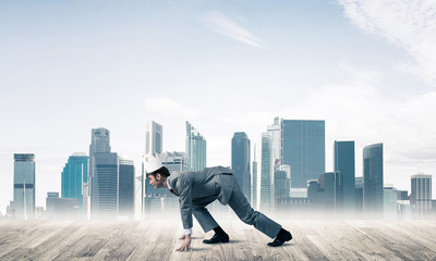 King businessman in elegant suit running and modern cityscape at