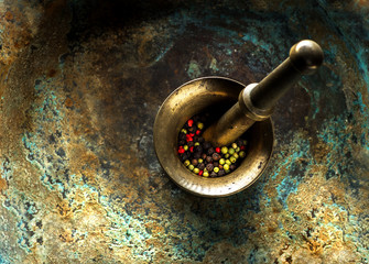 Pepper in a metal mortar