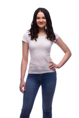 Fototapeta premium happy brunette young girl in blank t-shirt, isolated