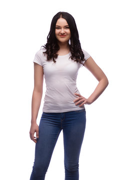 happy brunette young girl in blank t-shirt, isolated