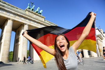Happy Woman With German Flag By Brandenburg Gate B © Maridav