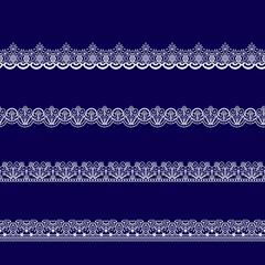 set of white lace ribbons