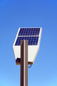 Rear of a solar powered streetlight against a blue sky, Vilamoura, Portugal.