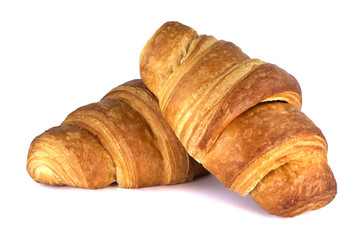 Delicious croissants on white background