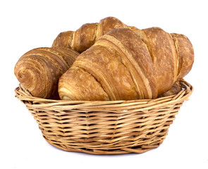 Tasty croissants in a basket