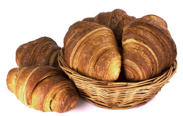 Tasty croissants in a basket