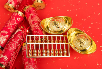 Chinese new year ornament--gold ingot,orange,golden coin and golden abacus,Chinese calligraphy Translation:good bless for new year
