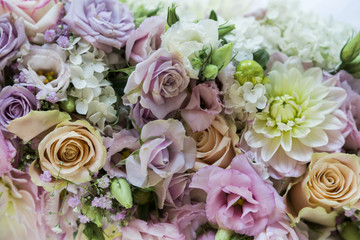 Romantic fresh wedding bouquet in pastel shades