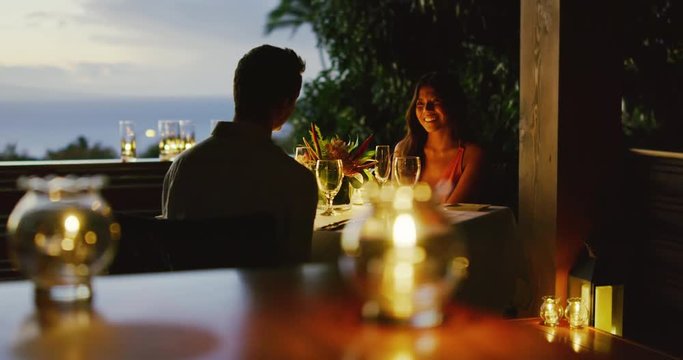 Couple enjoying romantic candle light dinner