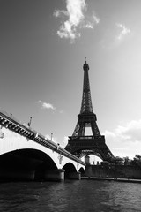 black and white view of the Eiffel Tower from the Seine