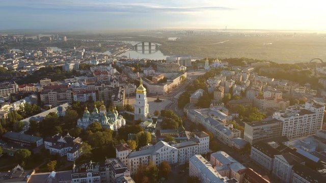 Kiev city center in morning lights. Dnipro river and Sophia Cathedral of Kiev, Ukraine. Aerial drone shot. 4K, UHD
