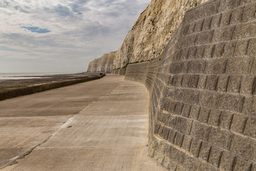 Fototapeta premium Chalk cliffs and coastline at Friars Bay in Peacehaven, near Brighton, East Sussex, England, UK