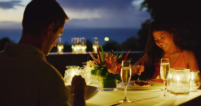 Couple enjoying romantic candle light dinner