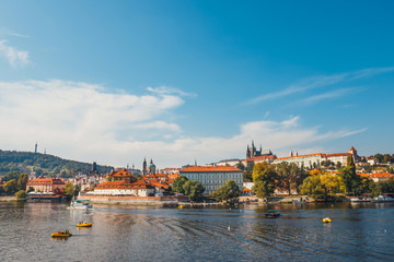 Naklejka na ściany i meble Vltava river and old downtown of Prague, the capital of Czech Republic