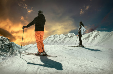 Men and Woman on the ski before sport action at sunny day around