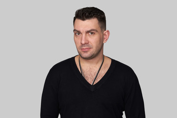 Handsome man portrait isolated on grey