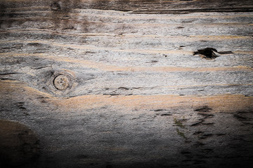 Naklejka premium Rough weathered wooden board. Rustic texture for background. Toned