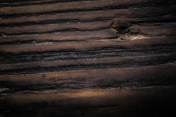 Rough weathered wooden board. Rustic texture for background. Toned