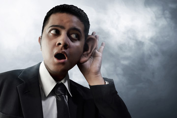 Business man listening