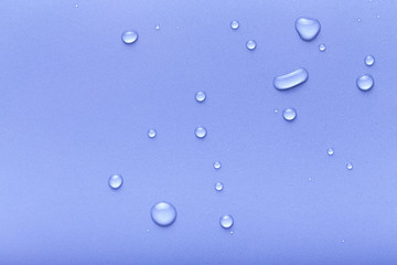 Drops of water on a color background. Gray. Toned