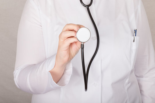 Woman doctor a color background. Selective focus