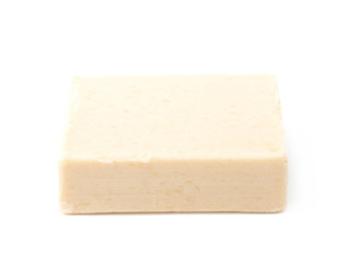 Beige piece of soap isolated