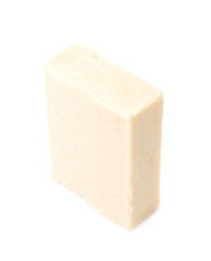 Beige piece of soap isolated