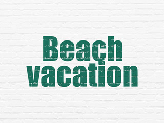 Tourism concept: Painted green text Beach Vacation on White Brick wall background