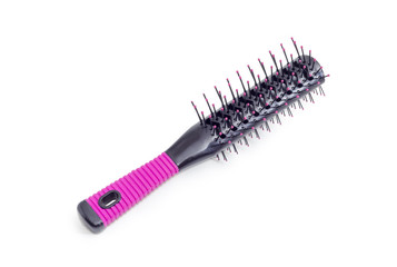 Hairbrush with plastic bristles on a white background