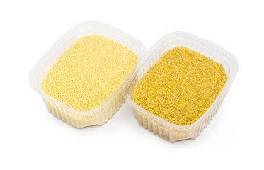 Uncooked couscous and bulgur in two small plastic containers