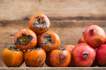 pomegranates on a wooden counter
