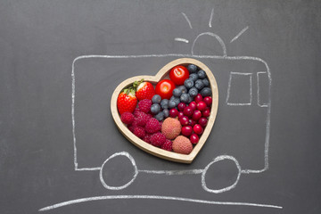 Health diet heart abstract concept with rescue ambulance on blackboard © udra11