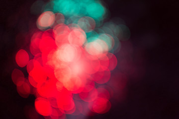 Abstract background with bright colorful dots of light, soft bokeh