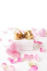 valentines gift box and rose flower petals