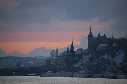 Colourful sunrise over Stockholm waterfront at winter in a cold morning - Powered by Adobe