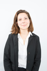 Portrait of wonderful young business woman on gray background