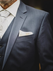 The cloth in the jacket of the groom