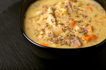 Indian Mulligatawny soup with lentil, parsley. Copyspace, horizontal view.