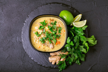 Indian Mulligatawny soup with lentil, parsley. Copyspace, top view.