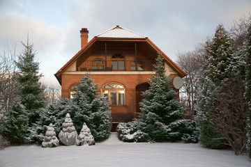 brick house in the winter garden